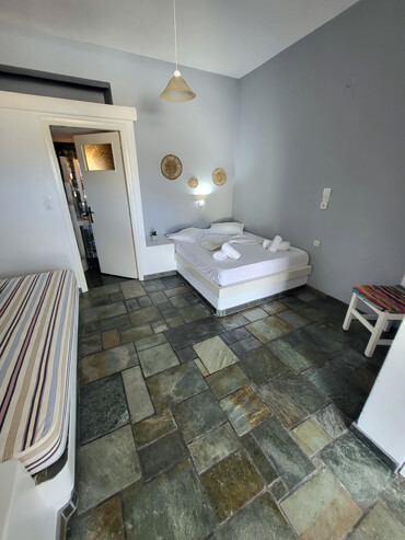 Double room with sofa and bed
